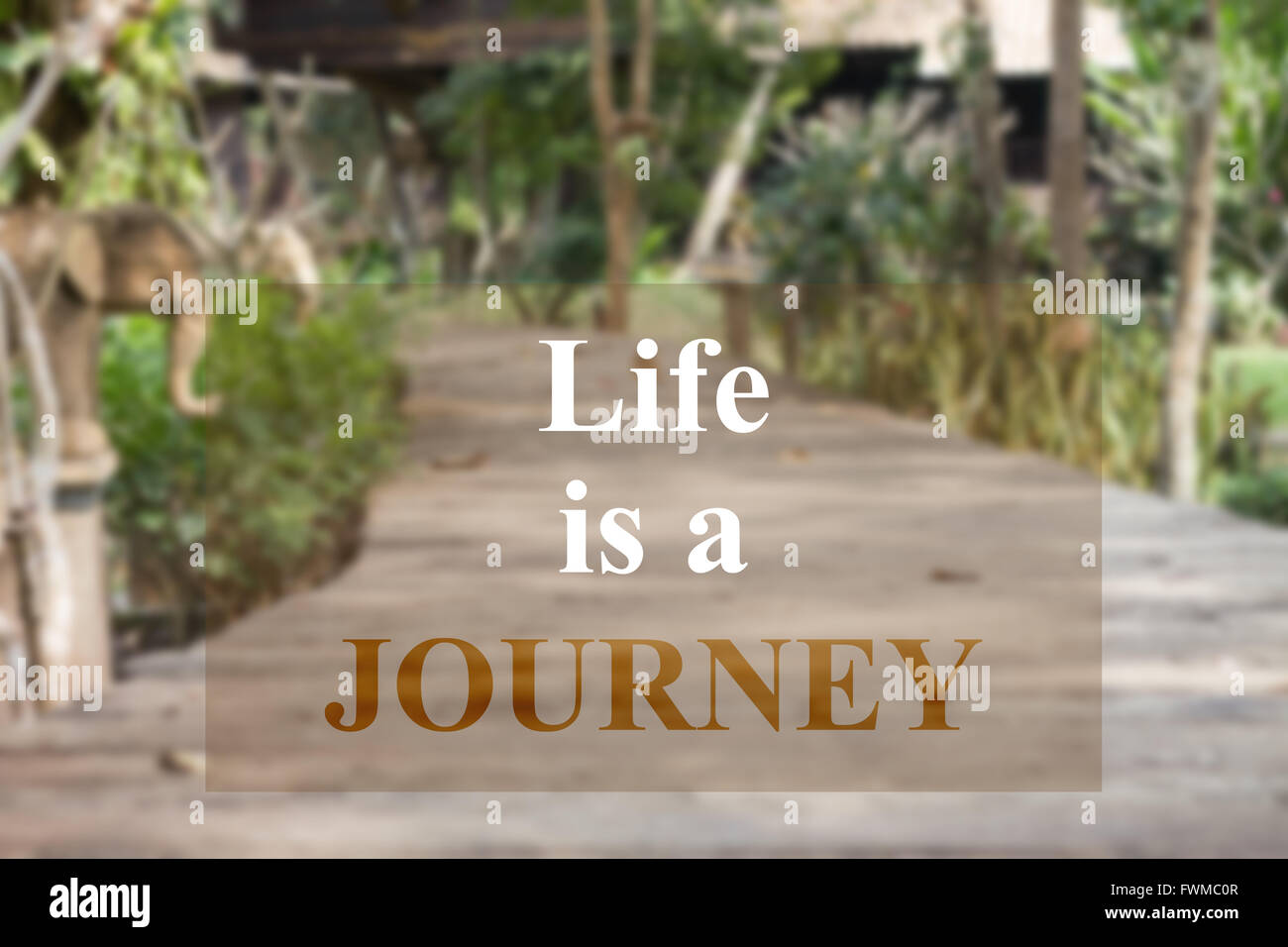 Das Leben ist eine Reise inspirierend Zitat auf Garten Hintergrund Stockfoto