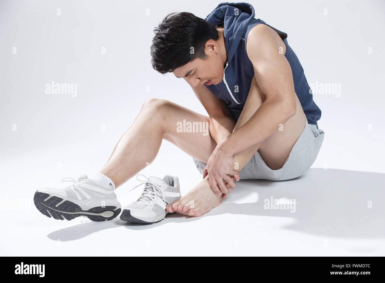 Mann Schmerzen im Sprunggelenk Stockfoto