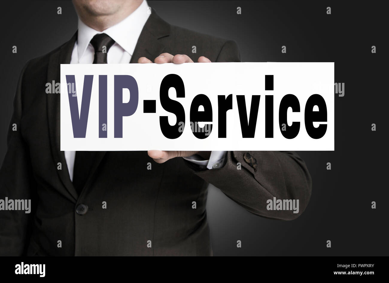 VIP-Service Zeichen vom Geschäftsmann gehalten wird. Stockfoto