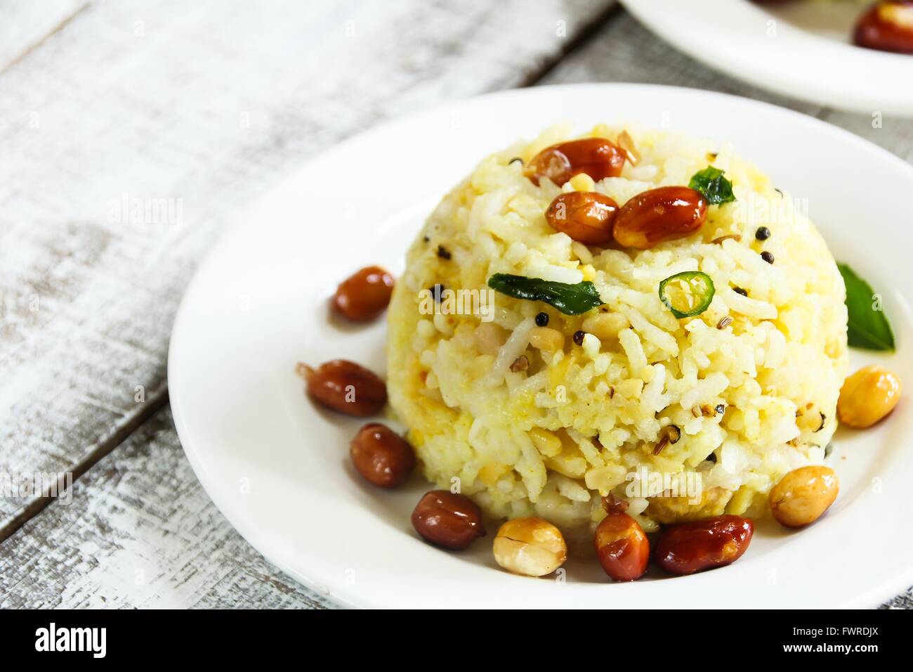 Pongal/Ponkal Linsensuppe Reis Tamil Nahrung aus Südindien Stockfoto