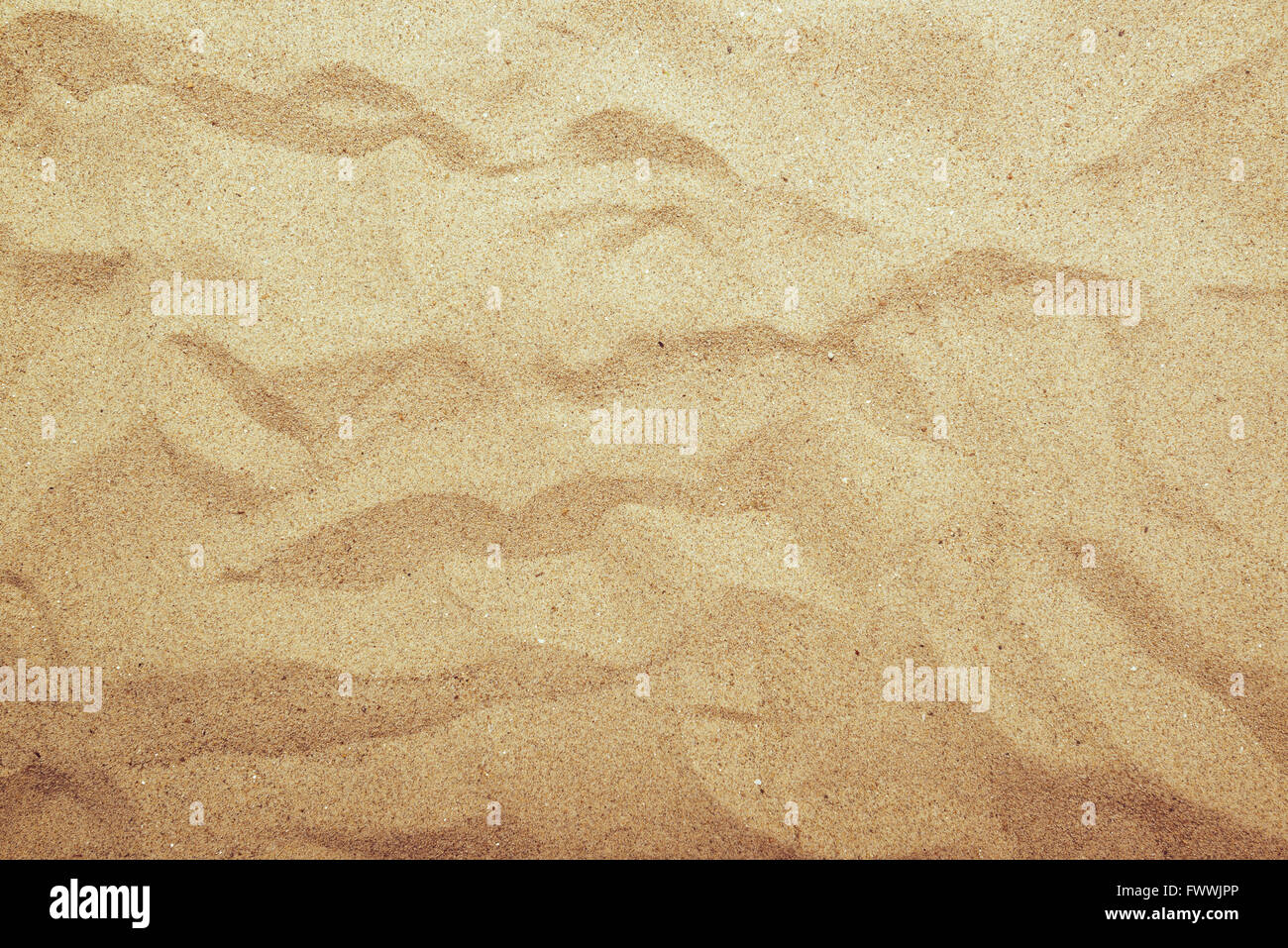 Sand Textur, Draufsicht des Sommer Strand Sand Oberfläche mit Farbverlauf Licht. Stockfoto