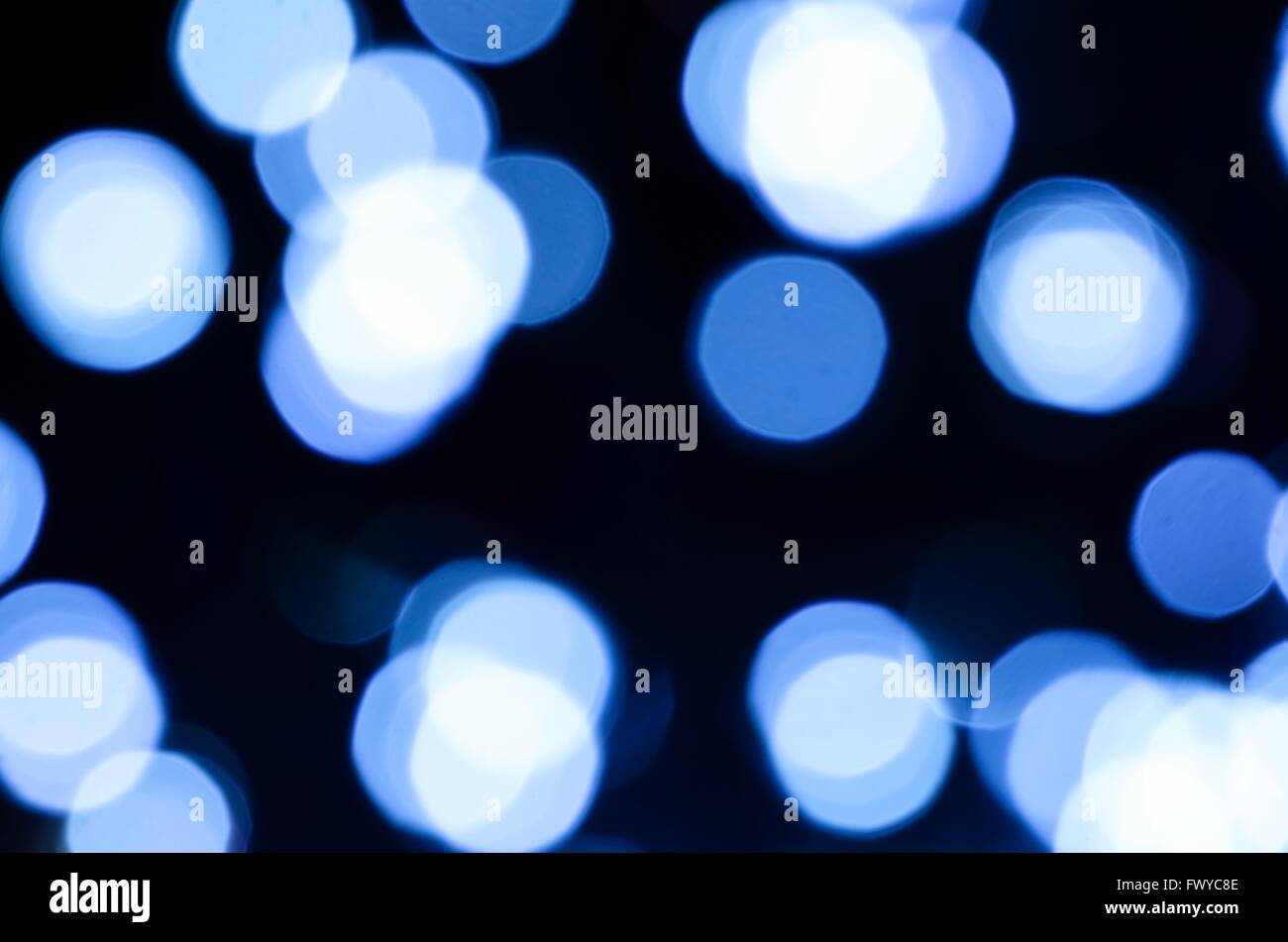 Schwarz-blauer Kreis verwischen Lichter als Weihnachten Hintergrund. Stockfoto