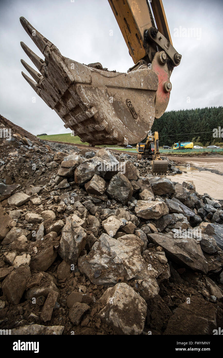 Bagger arbeiten im Steinbruch für Grenzen Eisenbahn Bau, Schottland Stockfoto