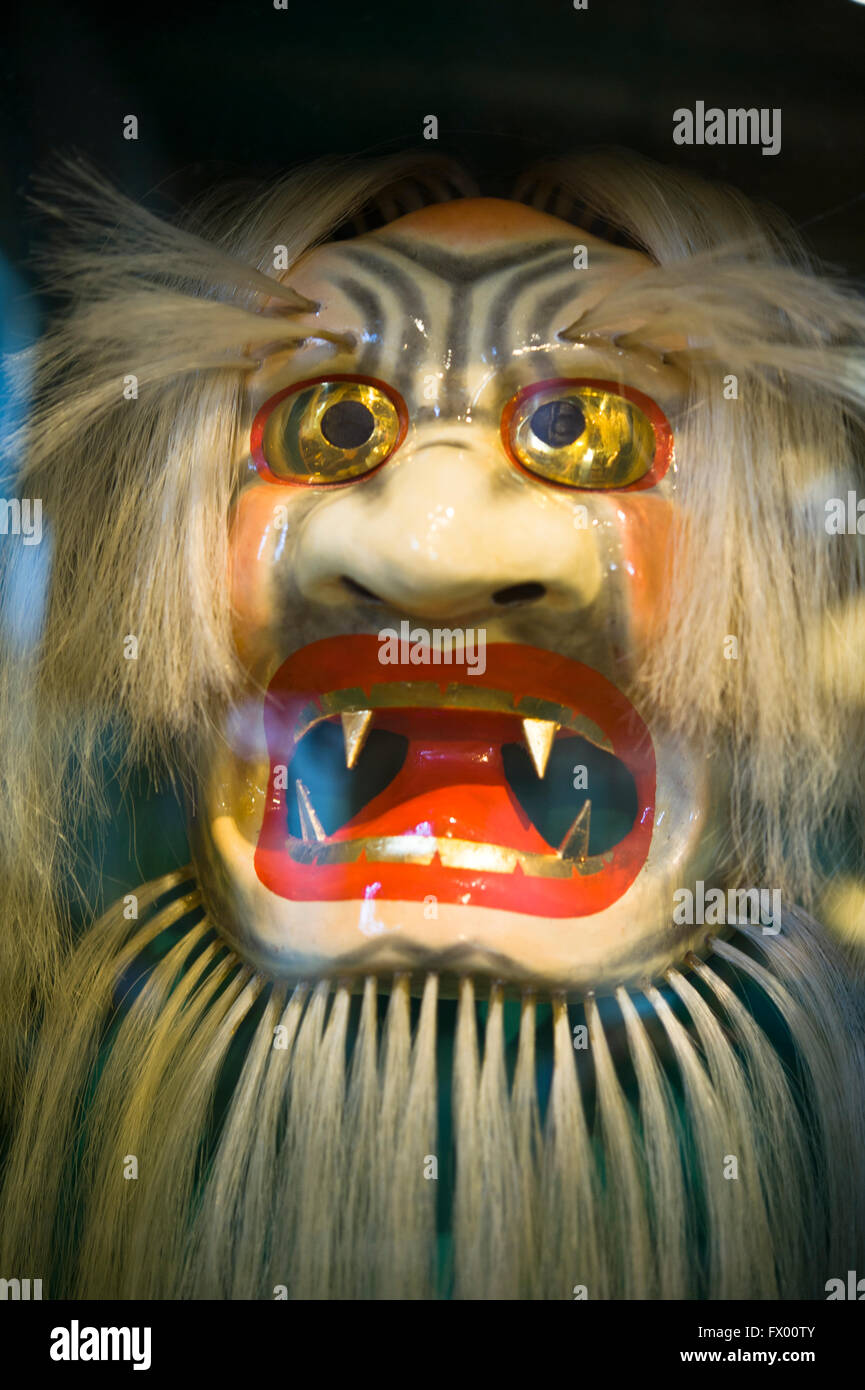 Japanische Maske auf einem Antiquitätenladen display Stockfoto
