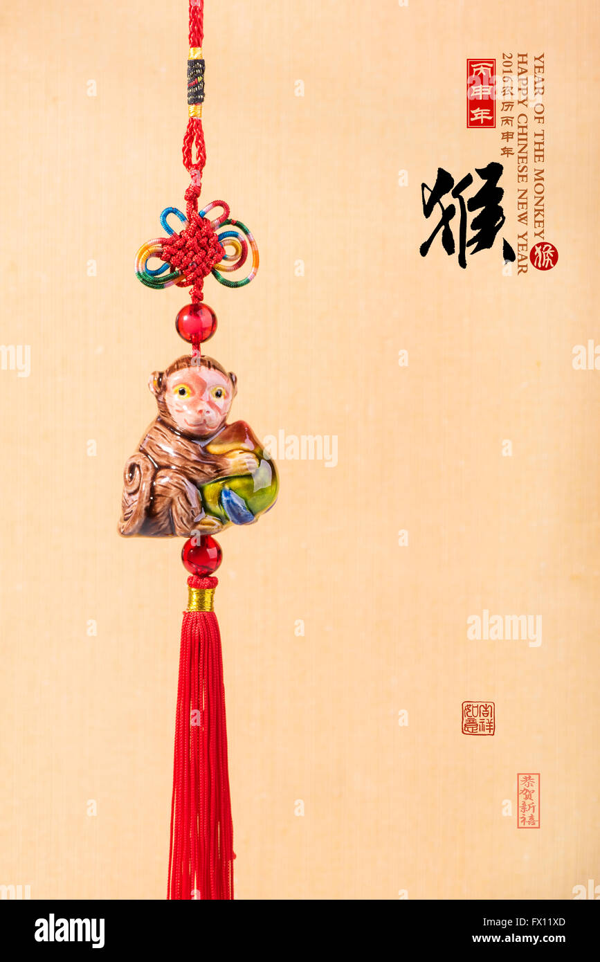 Souvenir Keramik Affe auf altem Papier, ist 2016 Jahr des Affen Stockfoto