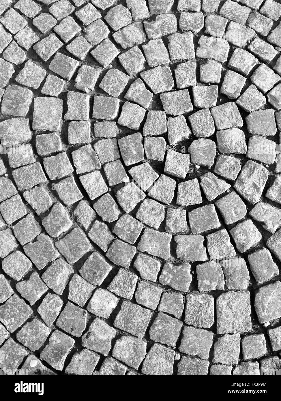 Gehweg Steinplatten gelegt in kreisförmigen Muster. Stockfoto