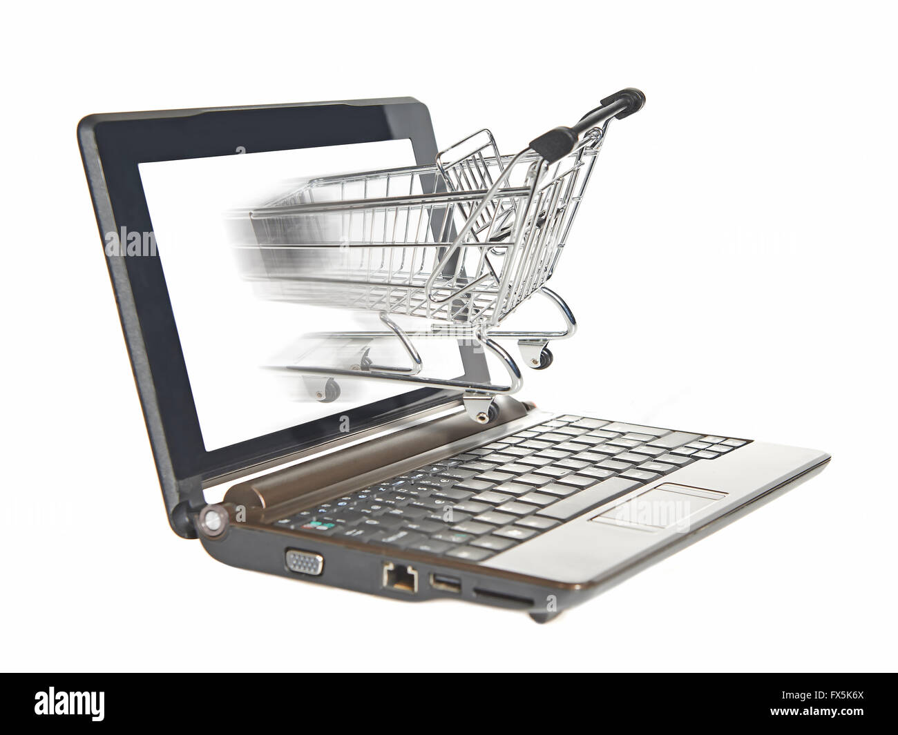 Einkaufswagen fahren in dem Bildschirm auf einem Laptopcomputer Stockfoto
