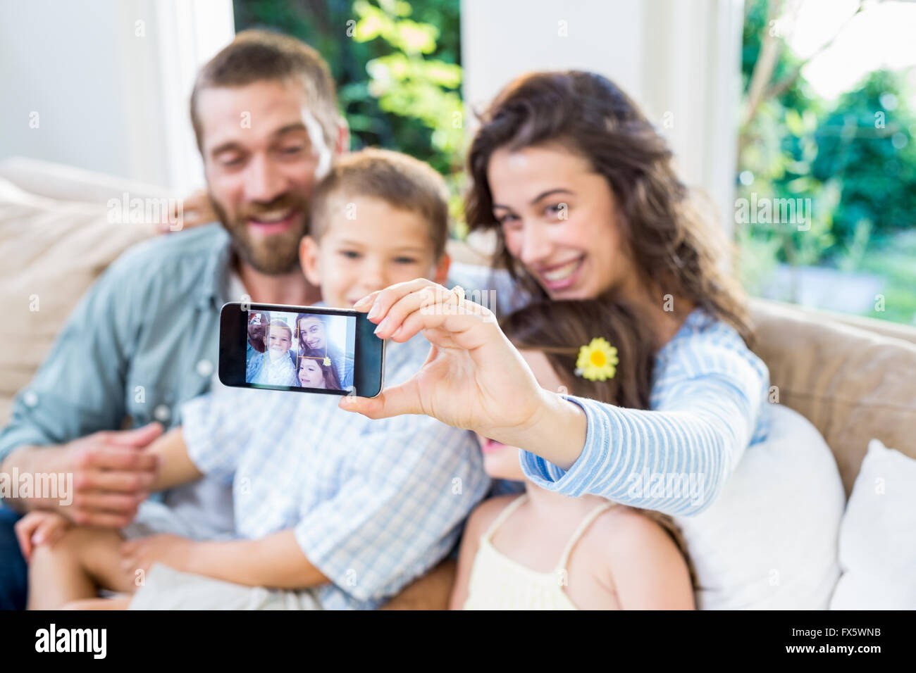 Glückliche Familie, die eine selfie Stockfoto