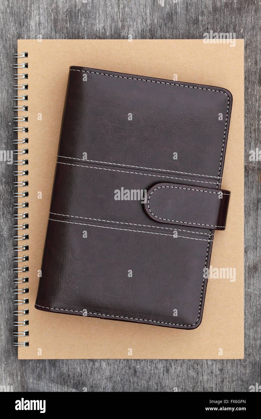 Braun Leder Organizer und Spirale notebook Stockfoto