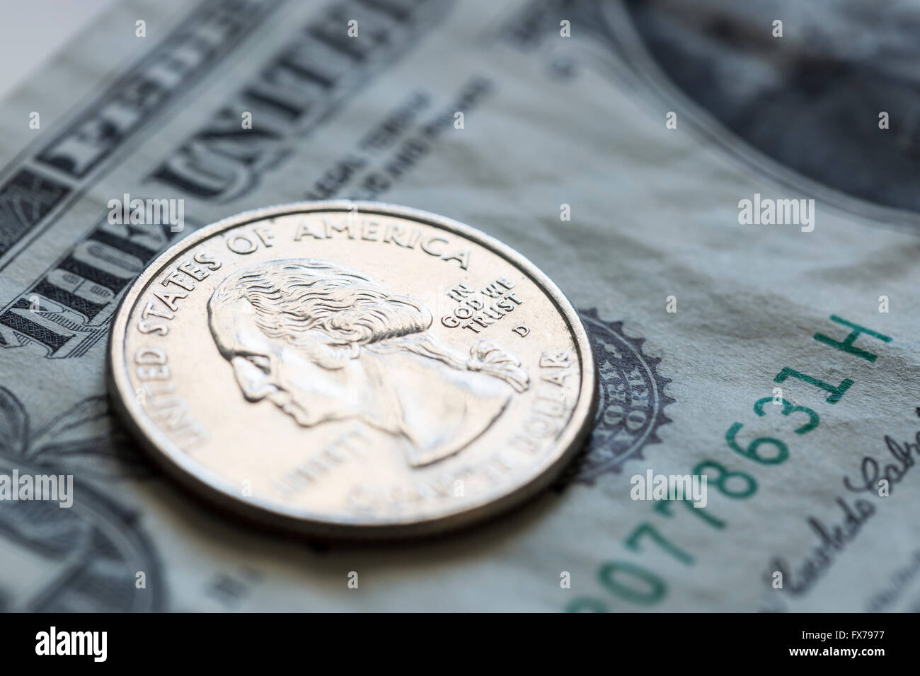 Quartal auf uns-Dollar Bill hautnah Stockfoto