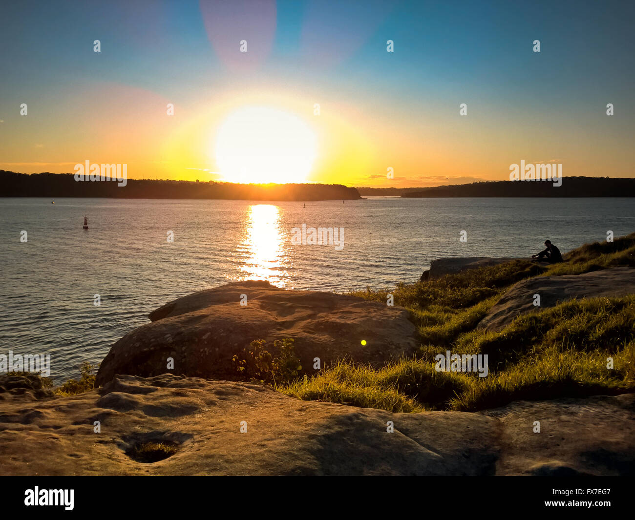 Warten auf den Sonnenuntergang am Watsons Bay, Sydney, Australien Stockfoto