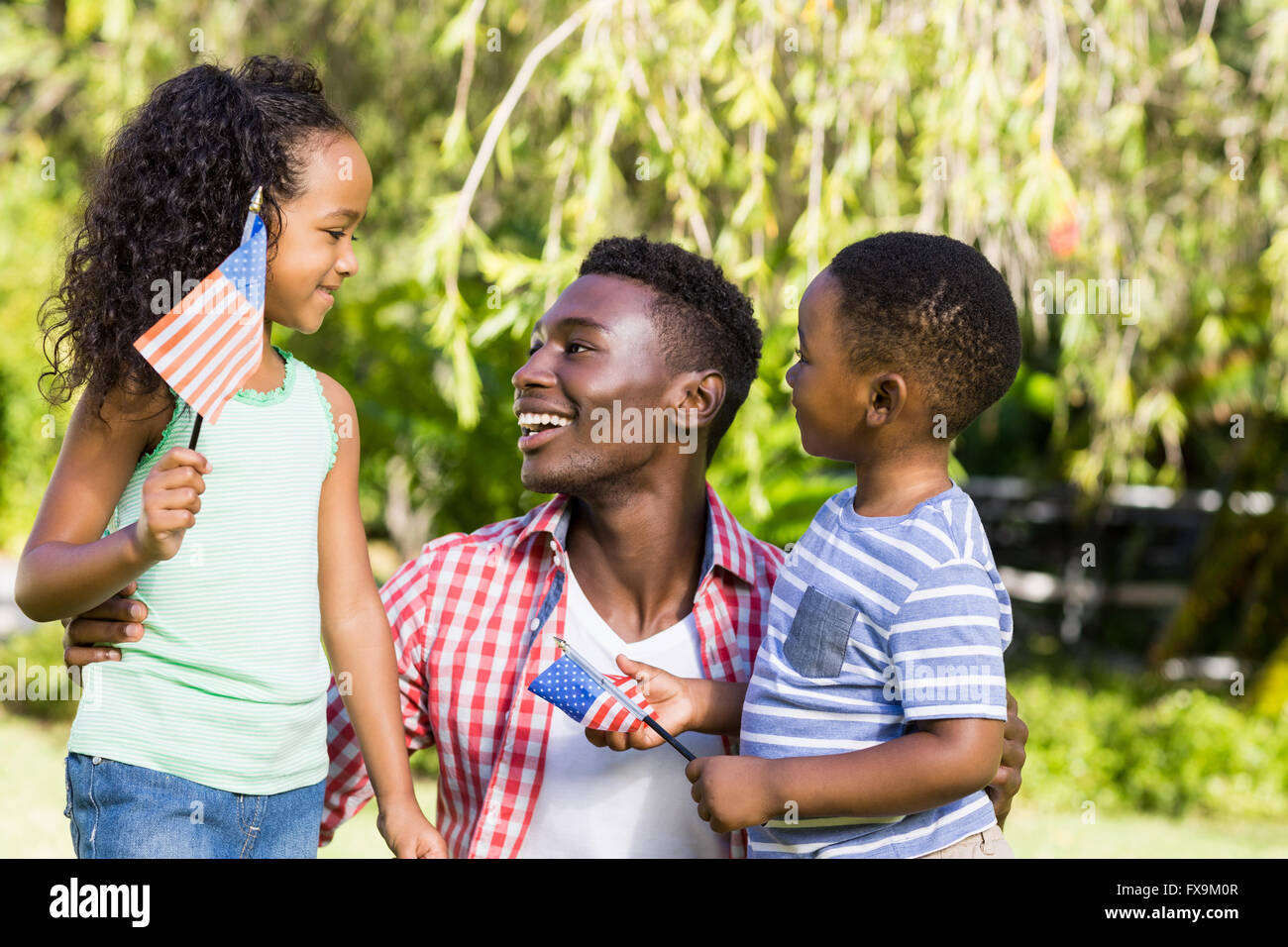 Glückliche Familie zusammen posieren Stockfoto