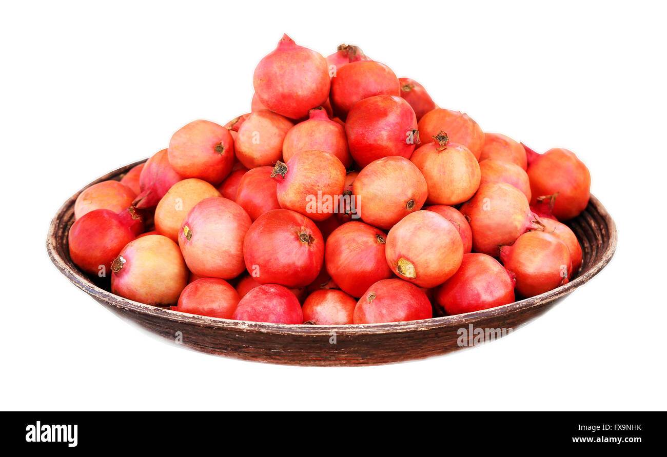 Köstliche Frucht Granaten auf den Teller fotografiert Closeup auf weißem Hintergrund Stockfoto