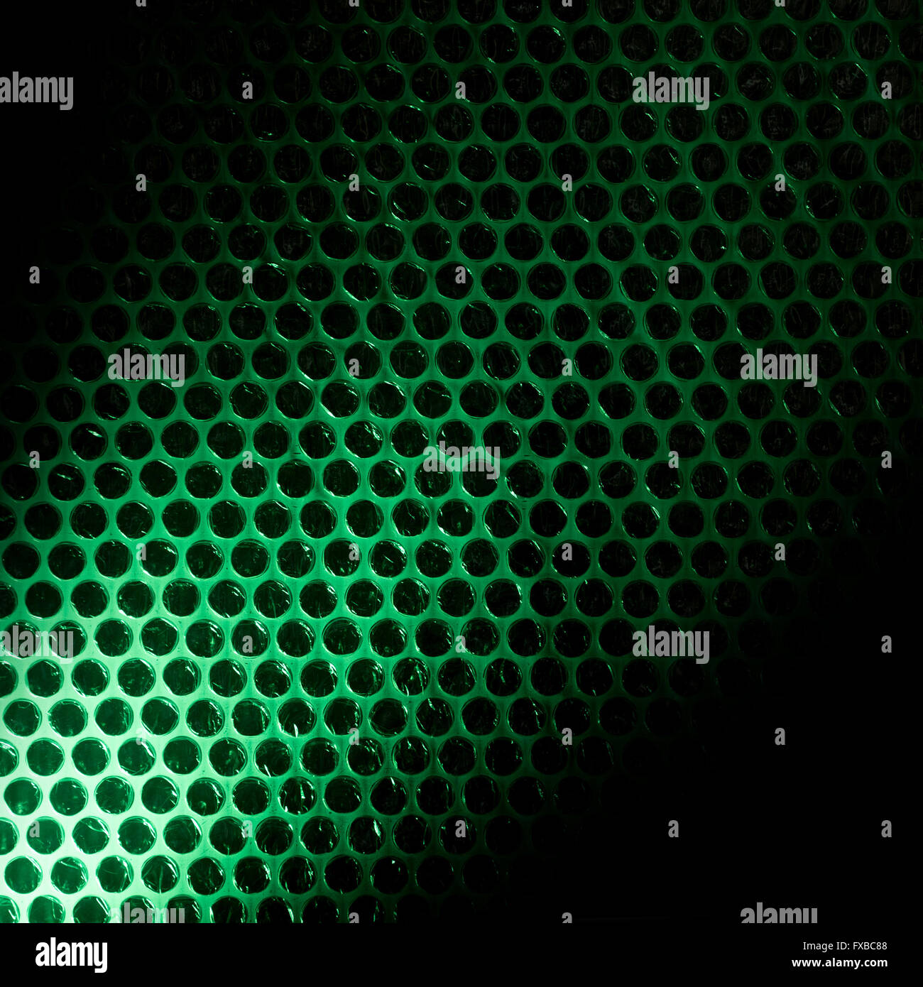 Luftpolsterfolie durch grünes Licht beleuchtet Stockfoto