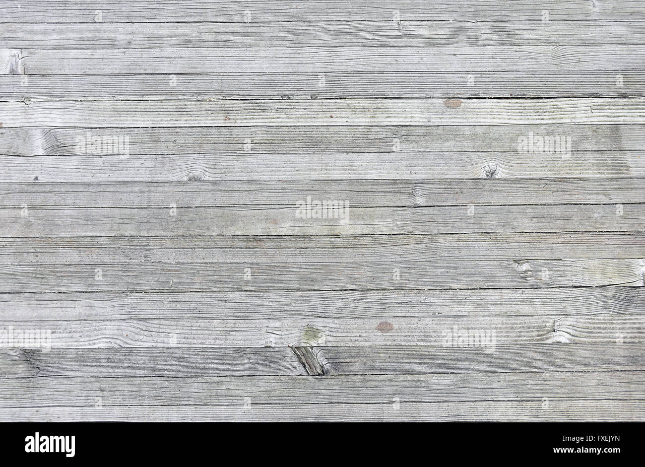 Horizontale verwitterte Holz grau hinterlegt. Stockfoto