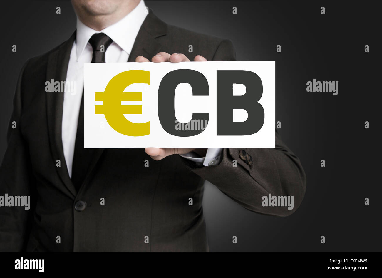 EZB-Zeichen vom Geschäftsmann Hintergrund gehalten wird. Stockfoto