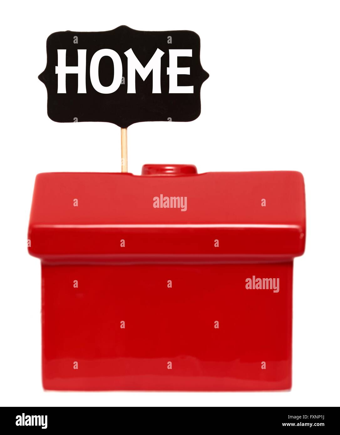 Rotes Haus mit nach Hause Schild Stockfoto