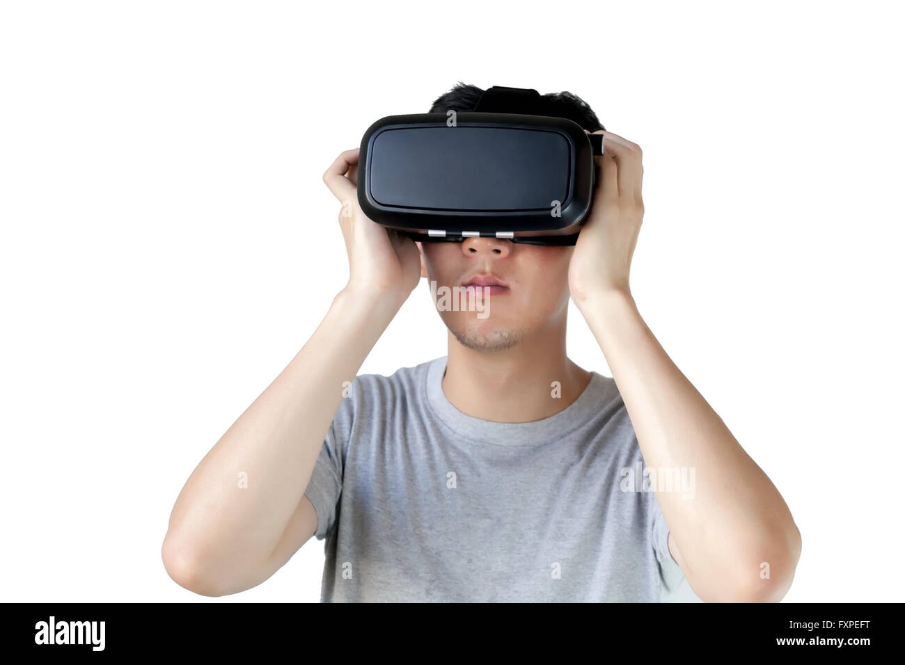 Asiatischer Mann VR Brille tragen und selbst in VR multimedia - weiße isoliert und Clipping Maske eintauchen.  VR ist die Simulation eines Stockfoto