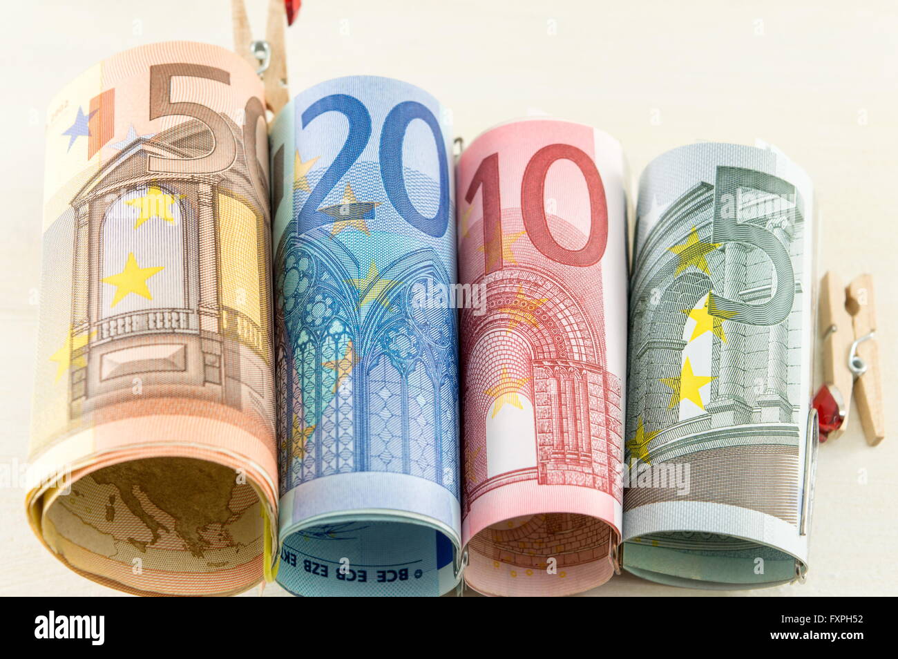 Euro-Scheine gerollt Stockfoto