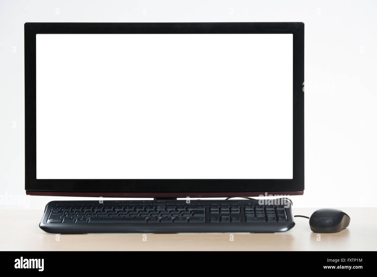 Computer-Monitor, mit Maus und Tastatur Stockfoto