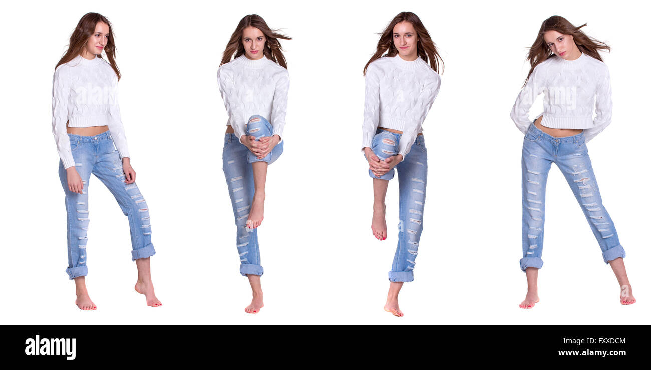 Hübsche junge Frau posiert in blauen Jeanse barfuß Stockfoto