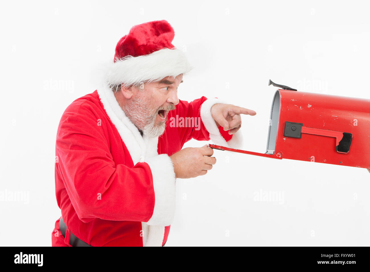 Seite Ansicht Porträt von überrascht Santa Claus im Briefkasten Stockfoto
