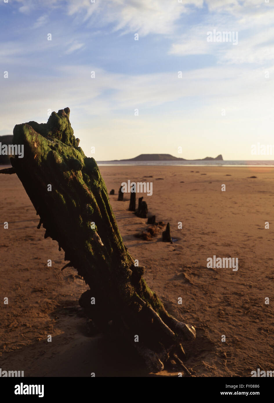 Helvetia Schiffbruch Rhossili Strandblick, Wurmkopf am sunset Gower Halbinsel South Wales UK Stockfoto