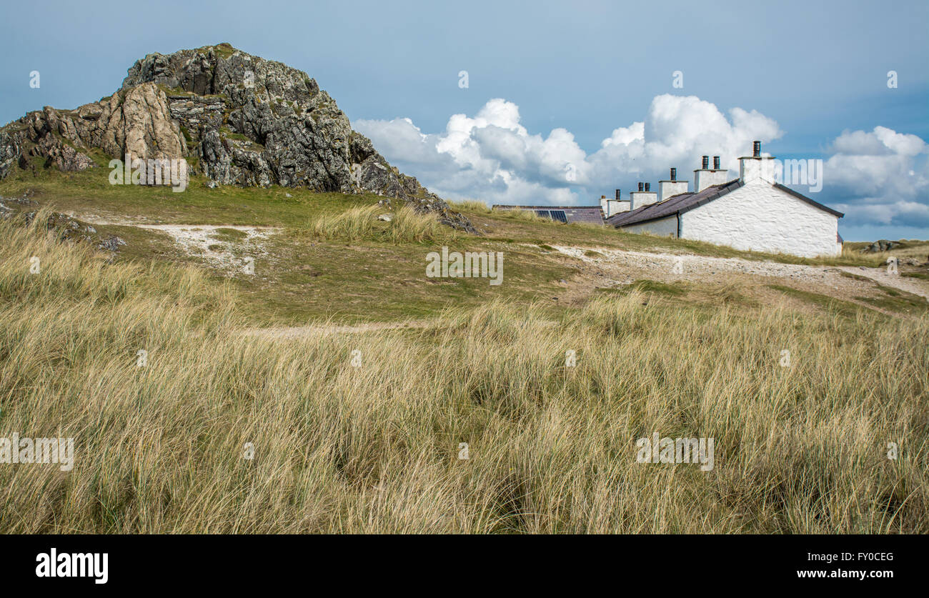 Die Pilot-Ferienhäuser auf Llanddwyn Island Stockfoto