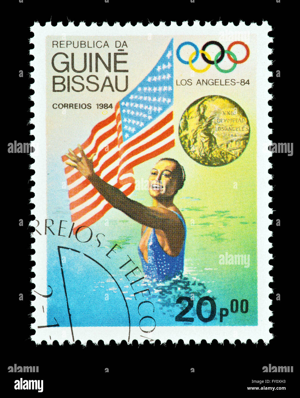 Briefmarke aus Guinea Bissau Darstellung Tracie Ruiz Synchronschwimmen gold Medaillengewinner aus den Vereinigten Staaten, 1984 Olympics Stockfoto