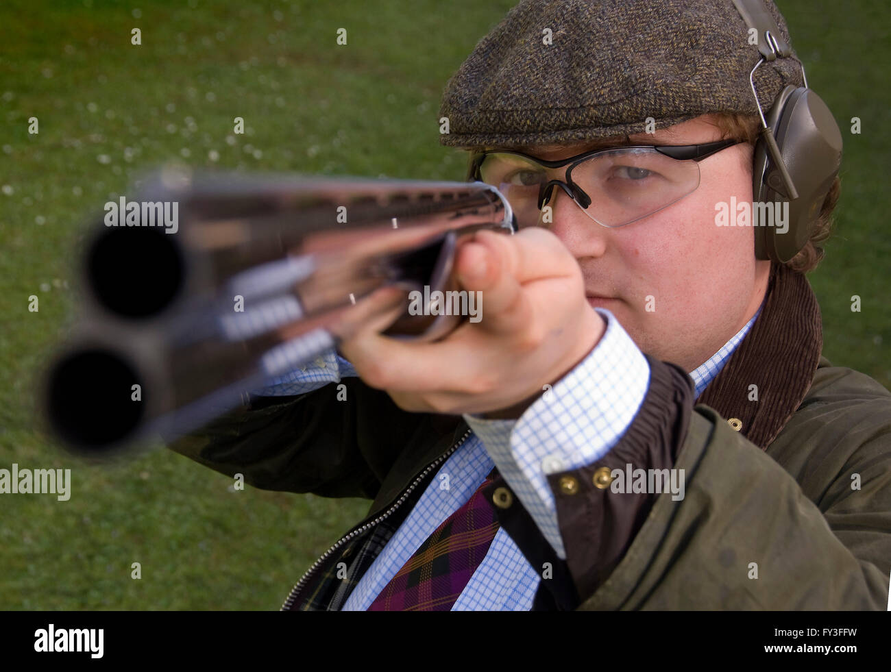 Das Ziel des HighA Shooting Seminars in Loyton Lodge, Morebath, Devonshire, Großbritannien, wobei Ed Cummings (Flat Cap) angewiesen wird, Schrotflinten zu schießen.A UK Stockfoto