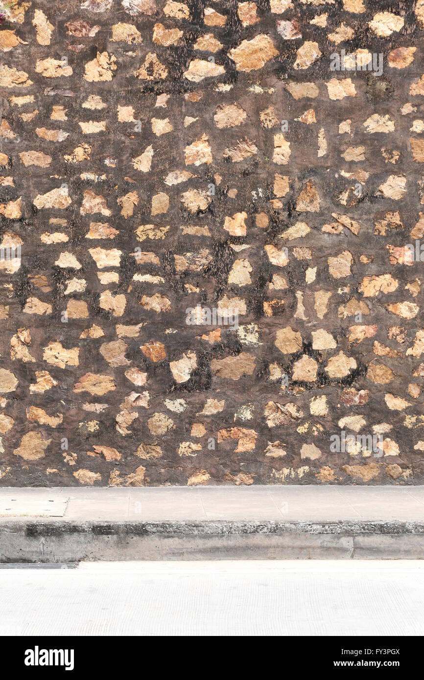 Hintergrund einer Steinmauer und Wege für Design. Stockfoto