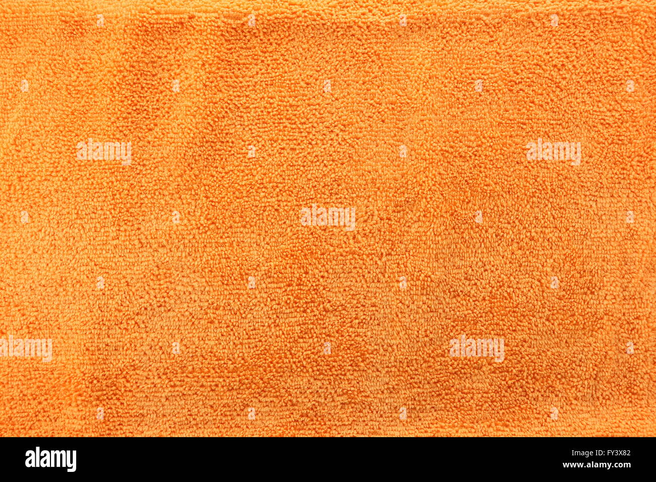 Orange Farbe Textur aus Mikrofaser Tuch für die Design-Hintergrund. Stockfoto