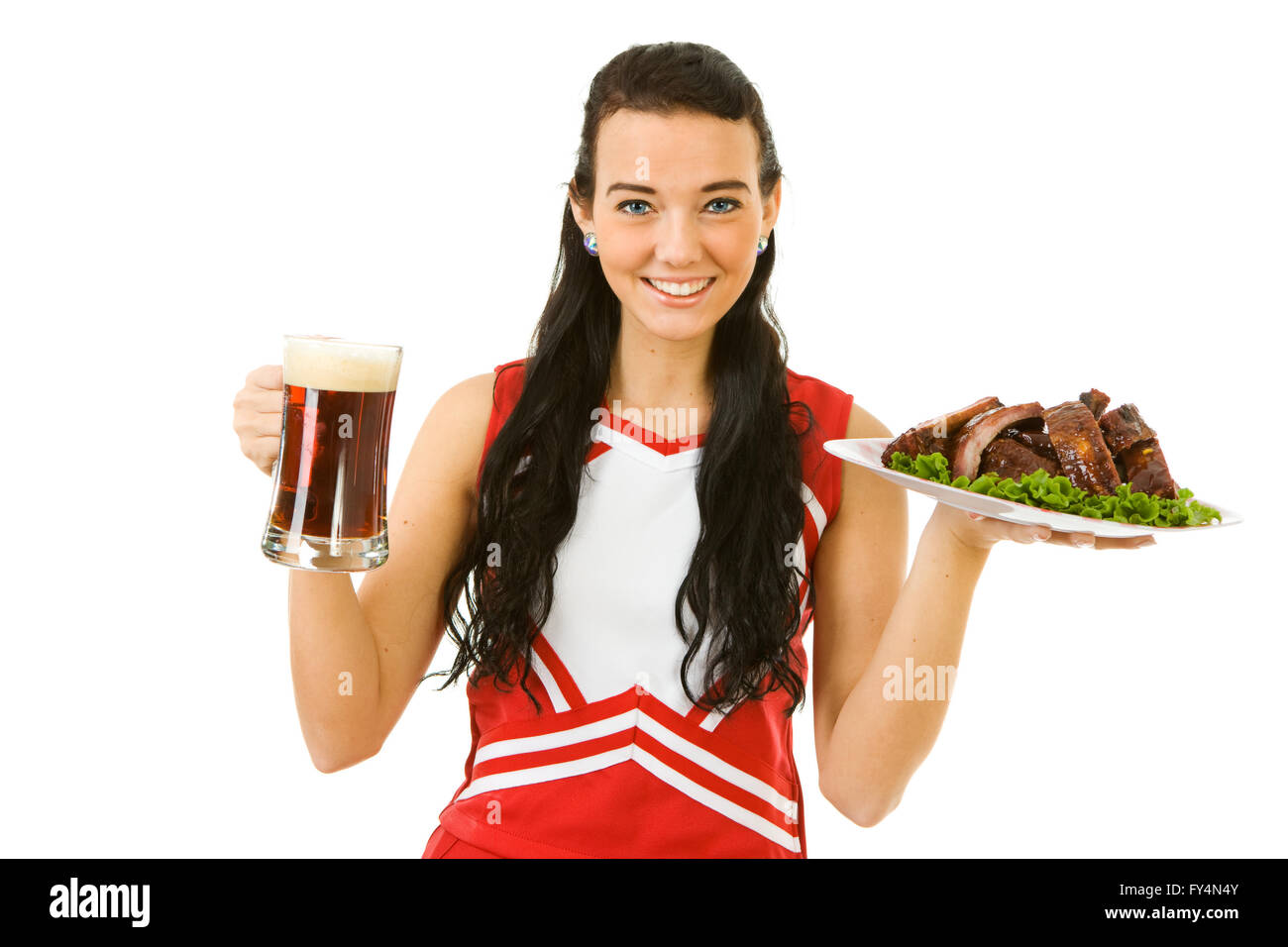 Süße Frau wie eine amerikanische Sportarten Cheerleader in roten und weißen Outfit.  Isoliert auf weißem Hintergrund. Stockfoto