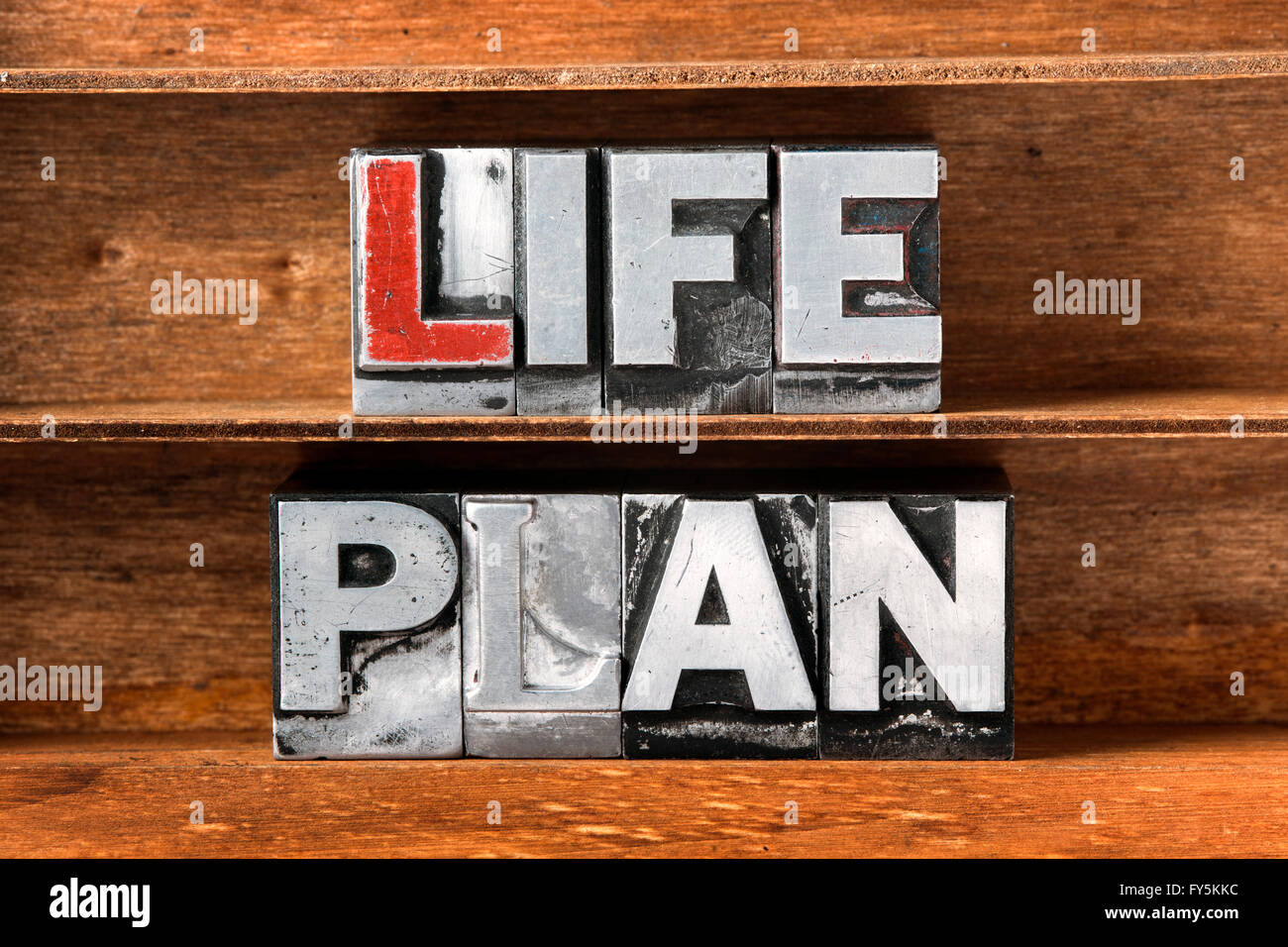 Leben Plan Satz aus metallischen Buchdruck auf Tablett aus Holz hergestellt Stockfoto