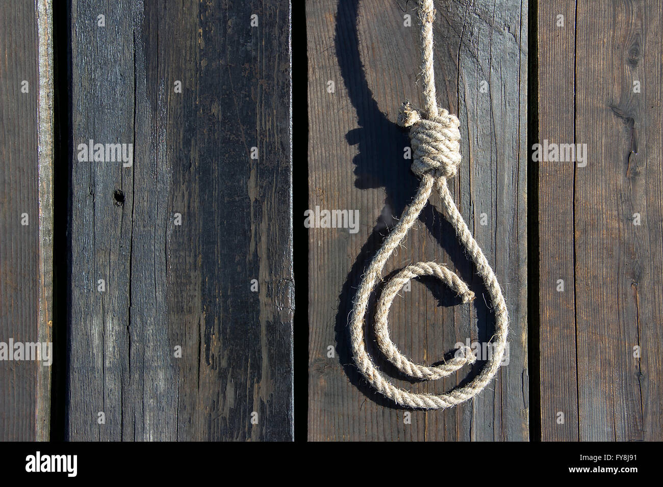 Copyright-Symbol als eine Schlinge auf einer Holzfläche präsentiert Stockfoto