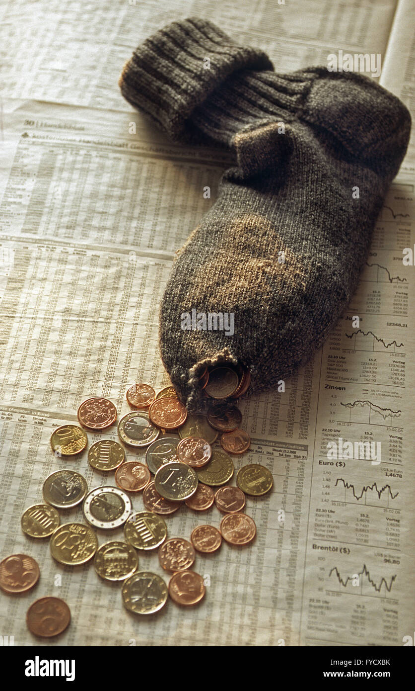 Geld-Socke mit Münzen Stockfoto