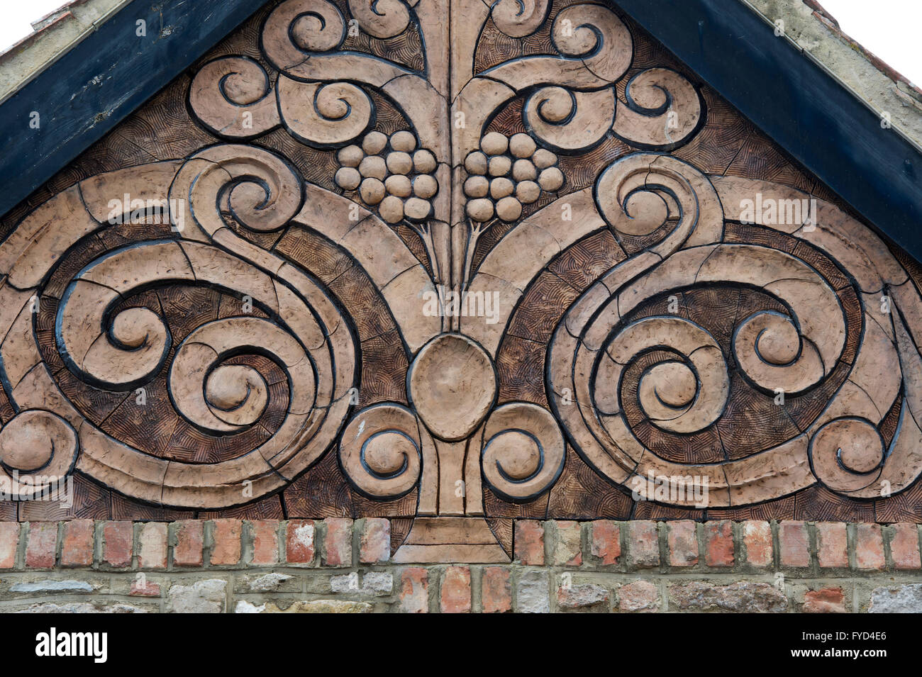 Dekorativen floralen Design Haus Wandpaneel. Wells, Somerset, England Stockfoto