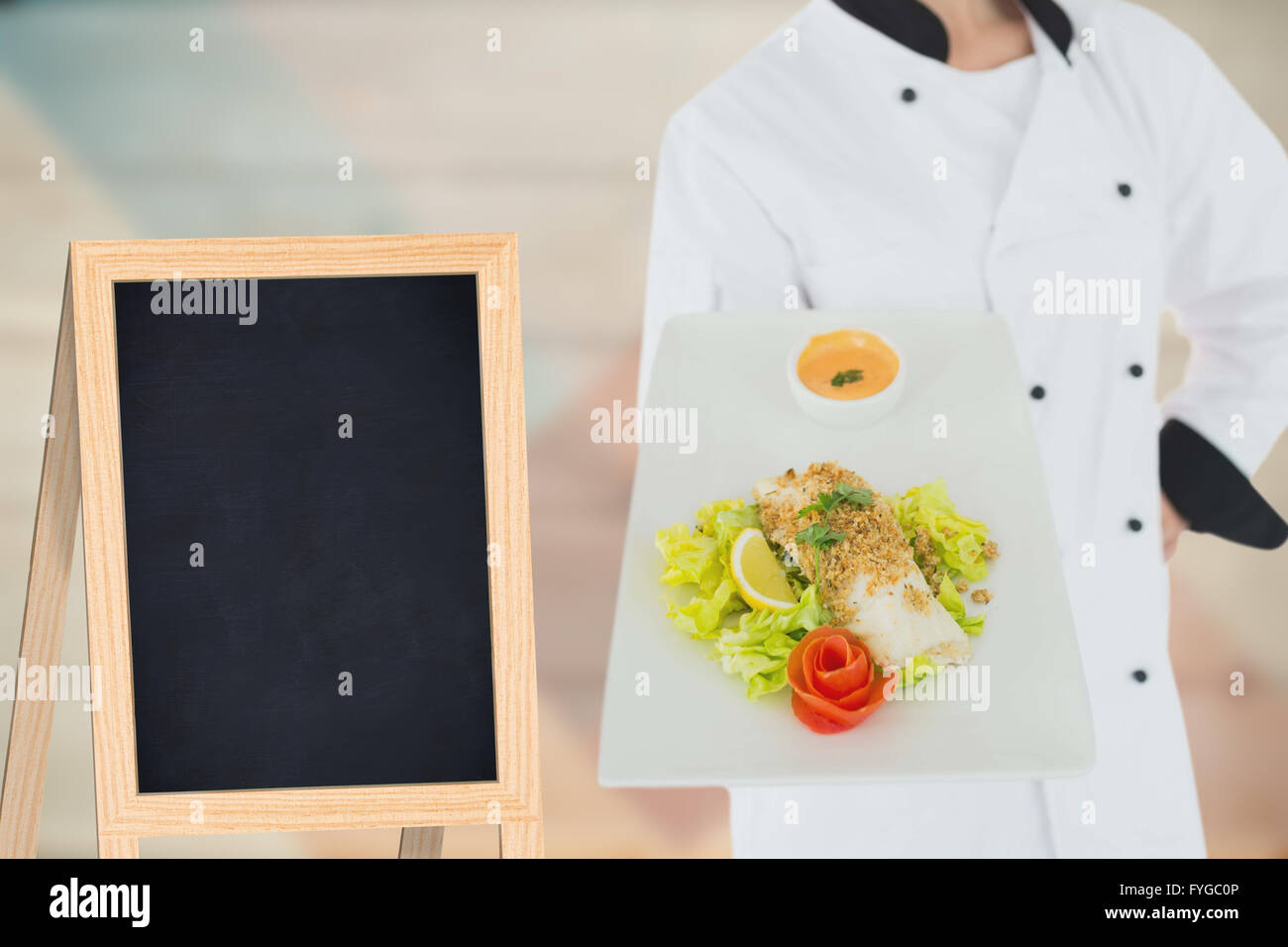 Zusammengesetztes Bild eines Kochs mit Gemüse Stockfoto