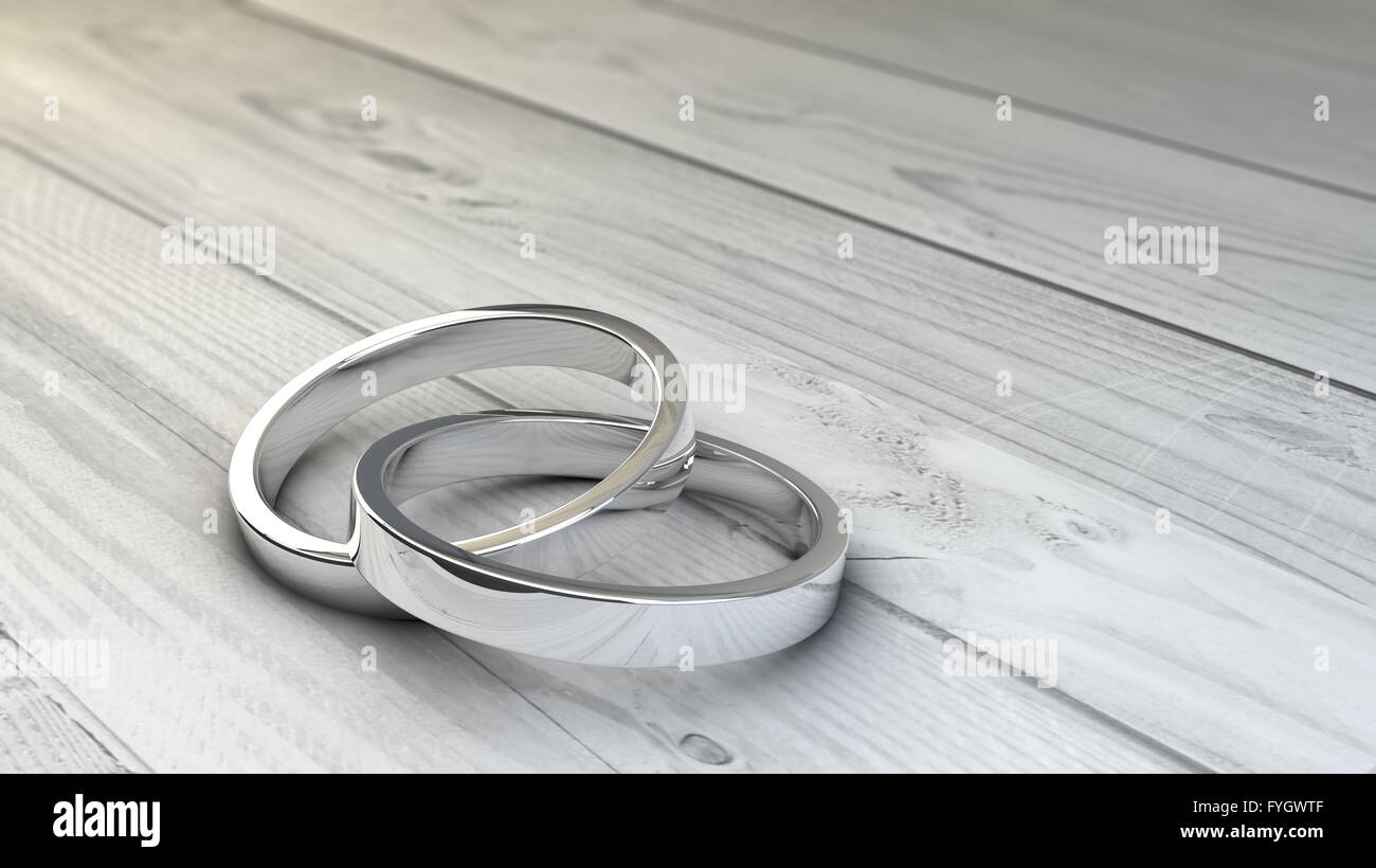 Digital erzeugte Ringe über hölzerne Hintergrund Stockfoto