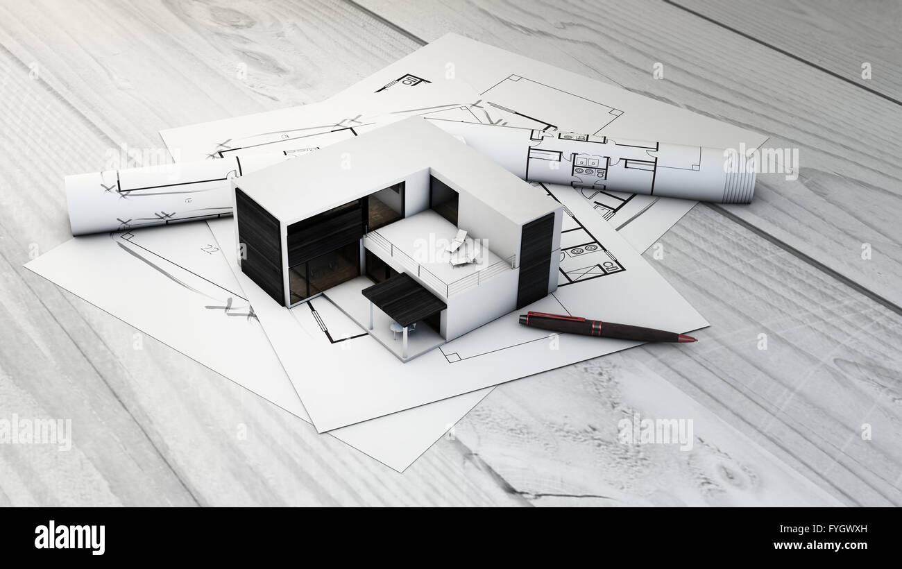 Modulares Haus und Grundstücke über Holztisch Stockfoto