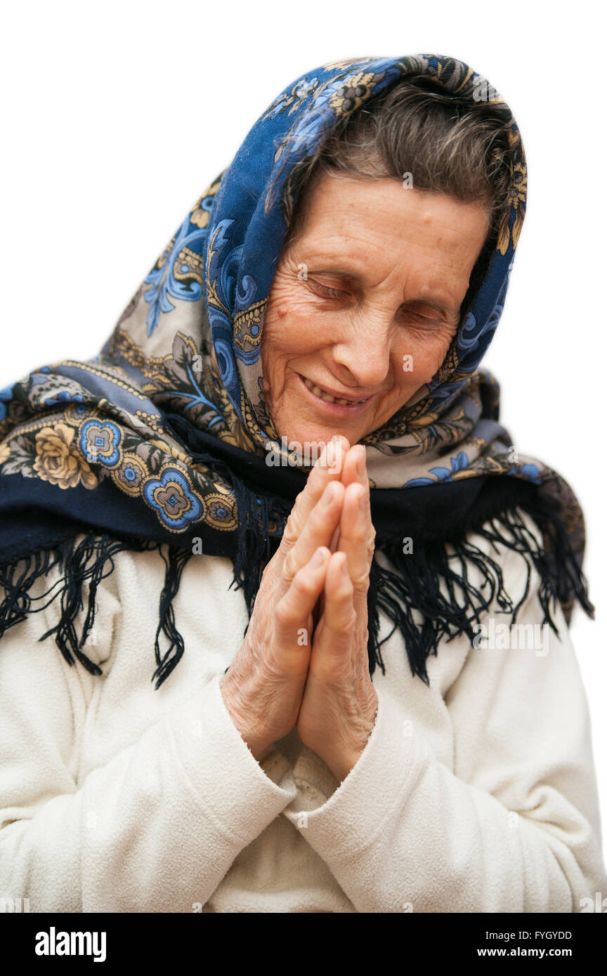 betende Frau Alter auf weißem Hintergrund Stockfoto