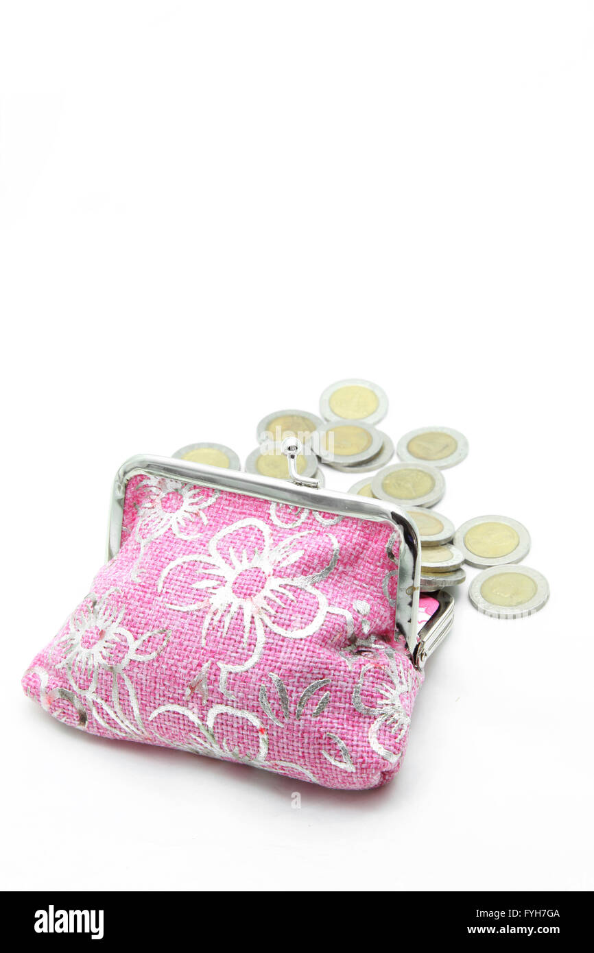 Münzen von Blume rosa Geldtasche oder Geldbörse isoliert verschütten Stockfoto