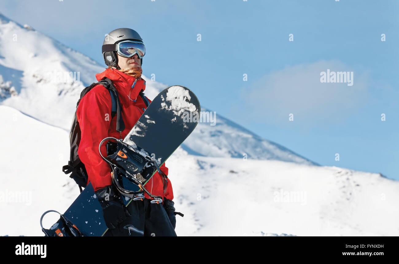 Snowboarder mit dem board Stockfoto