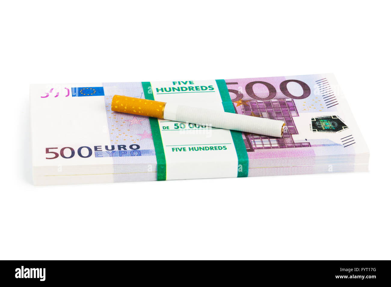 Geld und Zigaretten Stockfoto
