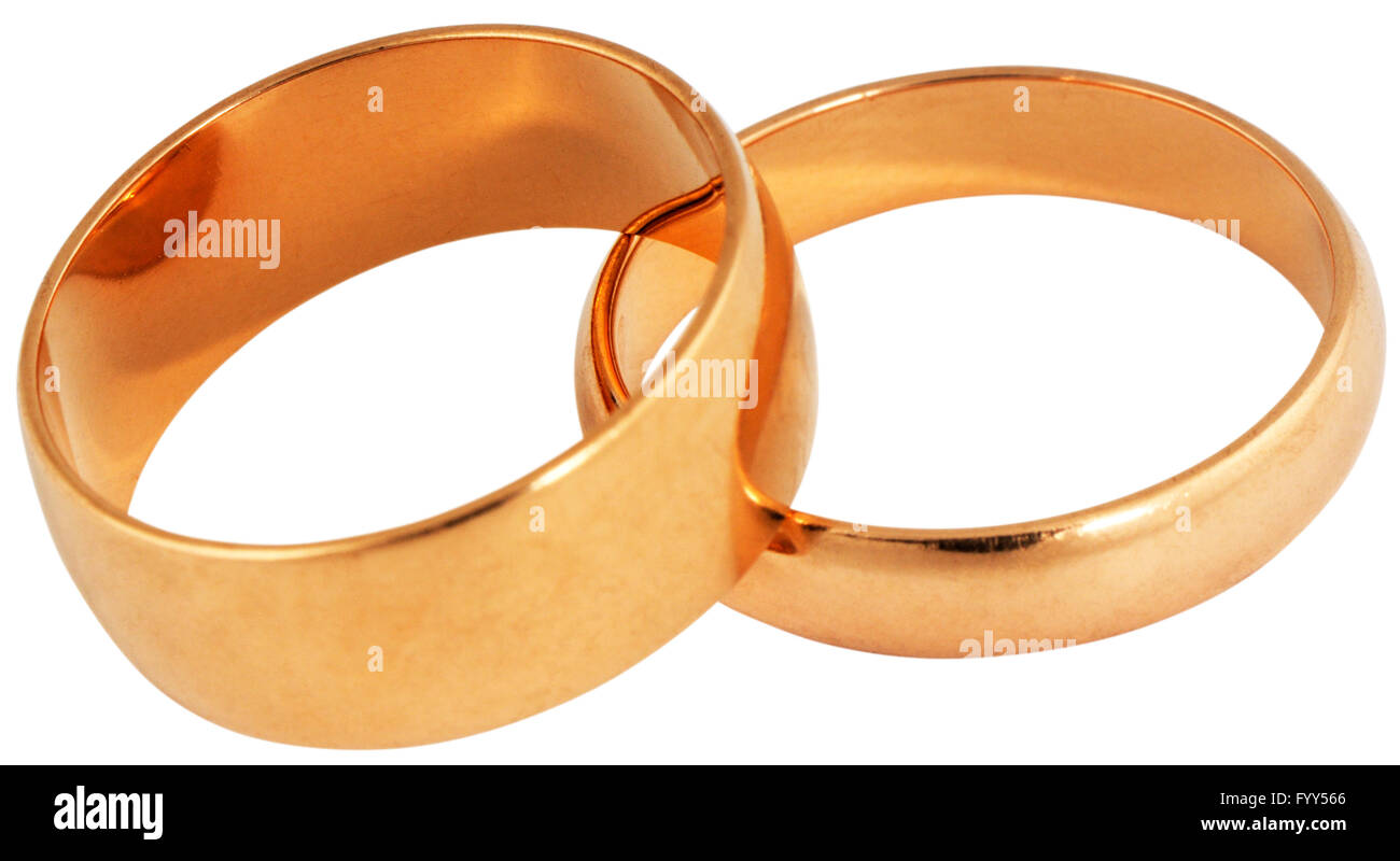 Zwei goldene Ringe isoliert auf weiss Hochzeit Stockfoto