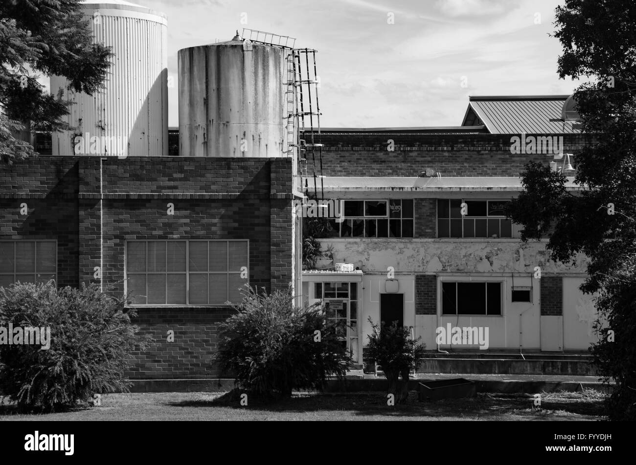 Teil des nun geschlossenen Peters Ice Cream Factory, mit externen Tanks auf dem Dach, 1939 gebaut Stockfoto