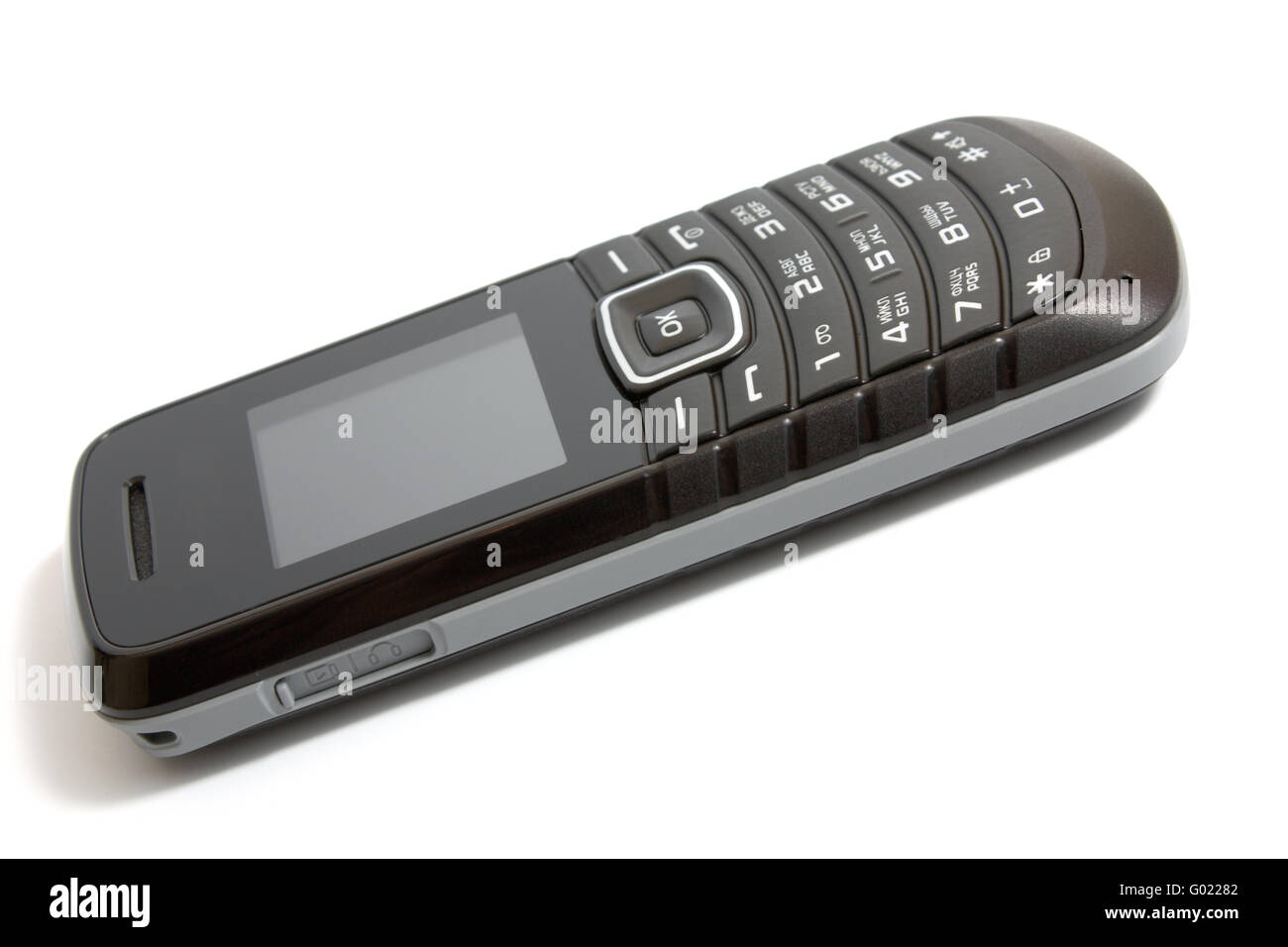 das Handy isoliert auf weißem Hintergrund Stockfoto