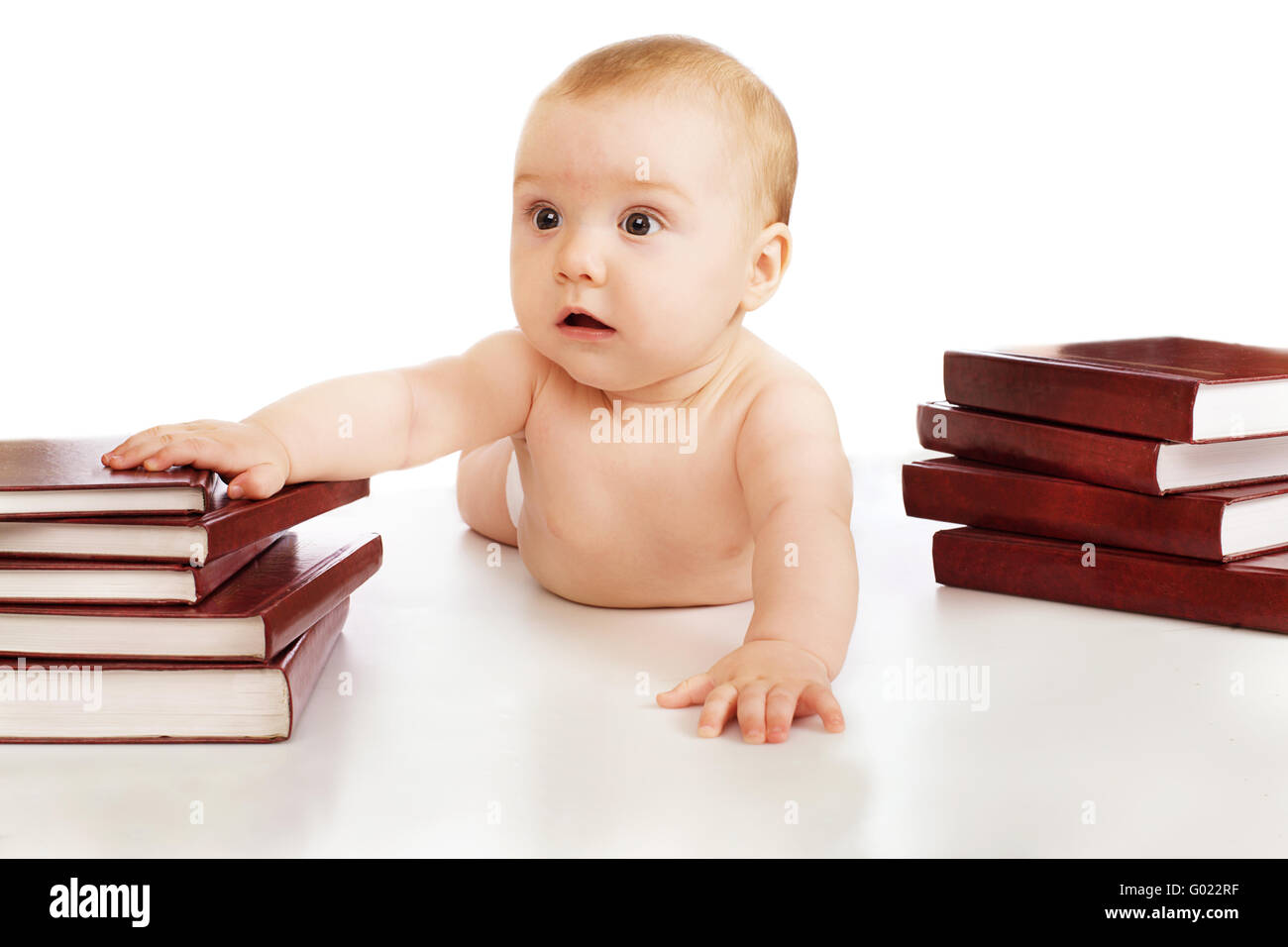 Baby und Bücher Stockfoto