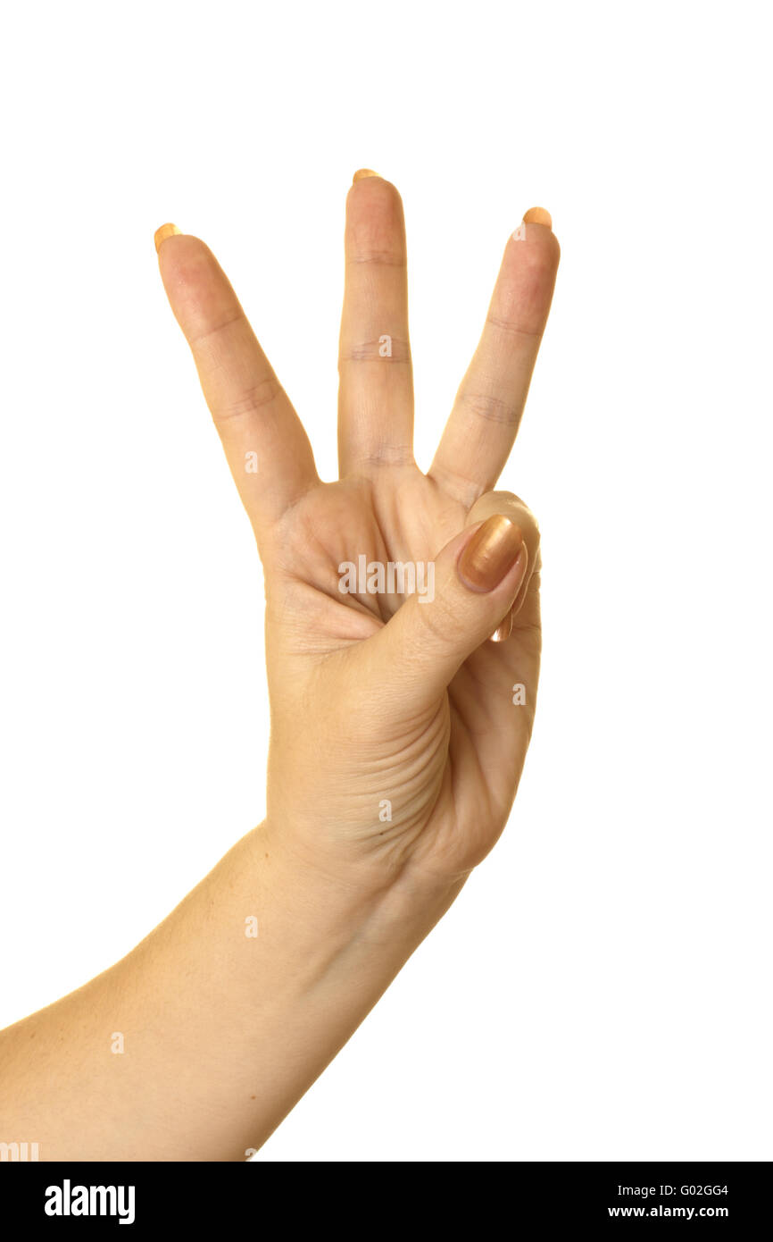 Drei Finger in der Luft von einer weiblichen Hand gehalten. Isoliert auf weiss. Stockfoto