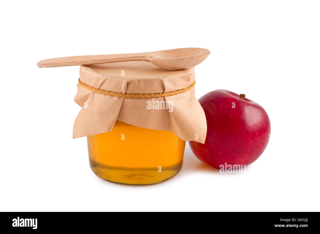 Honig im Glas Holzlöffel roten Apfel isoliert. Stockfoto